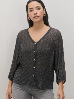 BLUSA DETALLE BOTON