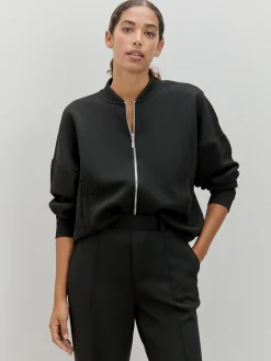 BOMBER DETALLE ESPALDA