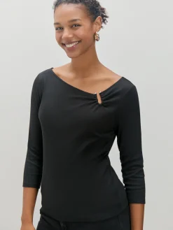 CAMISETA HEBILLA