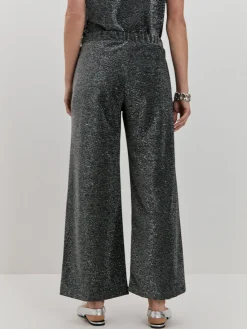 PANTALON BRILLO DETALLE