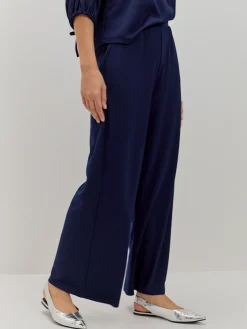 PANTALON LISO DETALLE