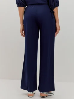 PANTALON LISO DETALLE